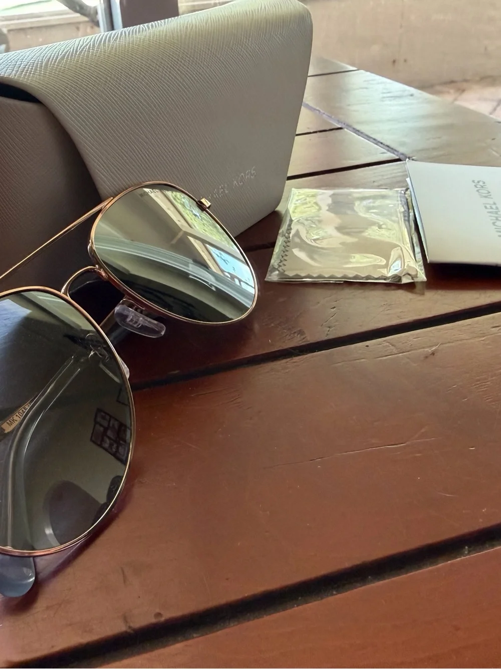 Michael Kors RoseGold Frame Sunglasses with Dark grey lenses/mirrored. With case